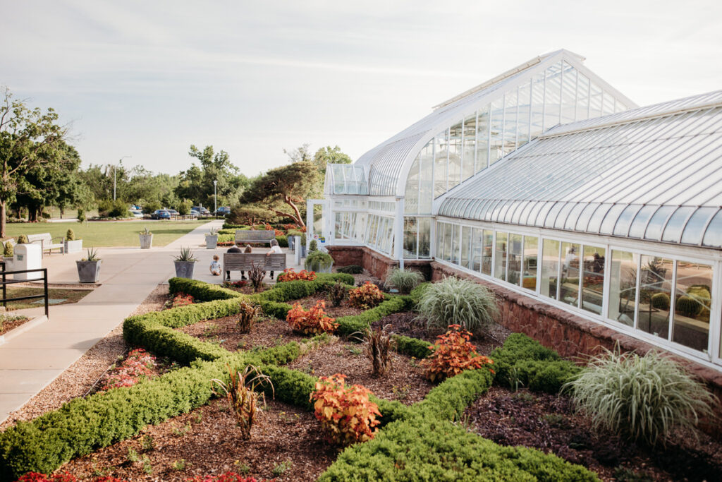 Will Rogers Conservatory exterior with lush gardens, a tranquil and picturesque wedding venue in Oklahoma City